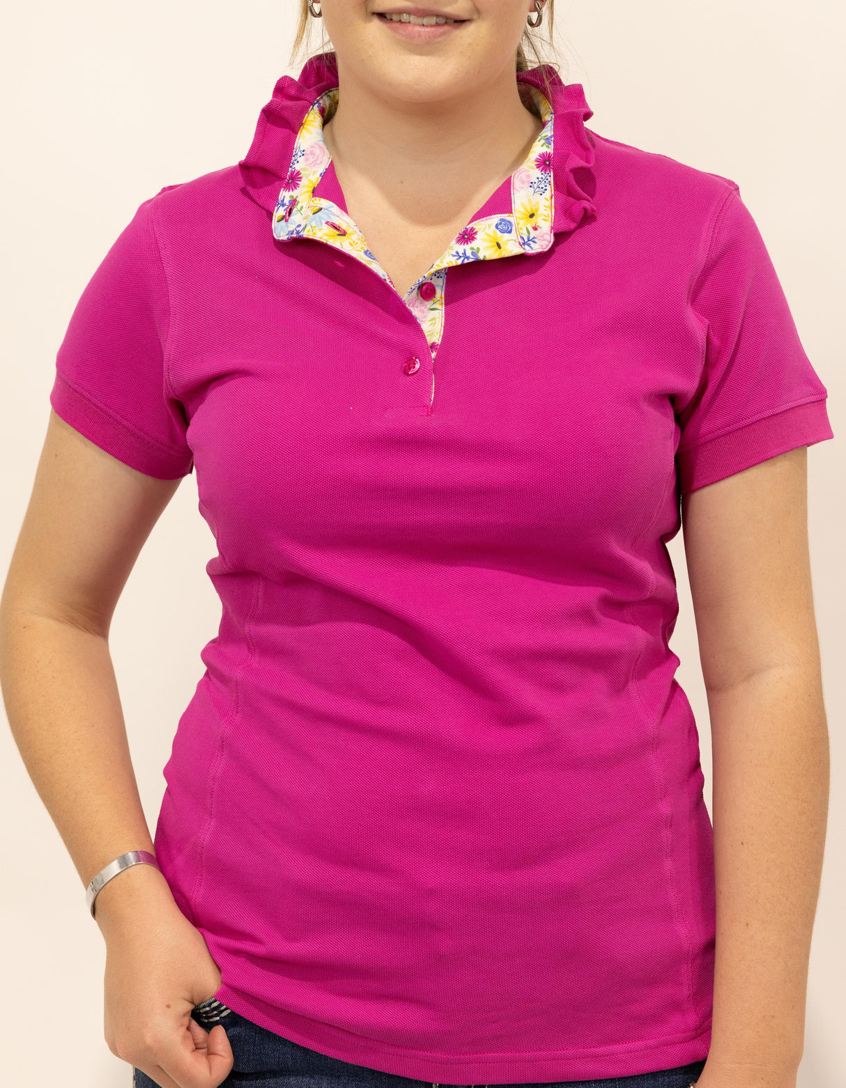 Pia - Pink Ruffle Polo Shirt with floral trim