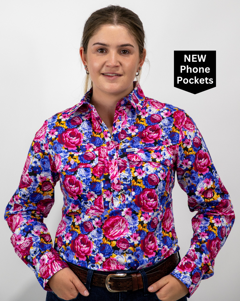 Woman wearing a colorful floral shirt with 'NEW Phone Pockets' text on a white background